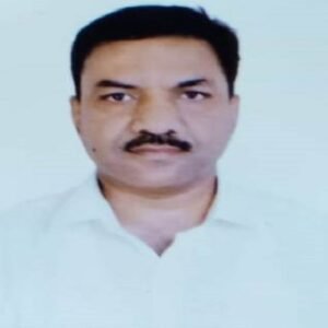 Mr. Virendra Kumar Agarwal, founder and director of V & V Real Estate, leading expert in home construction in Jaipur, posing confidently at a residential project site.